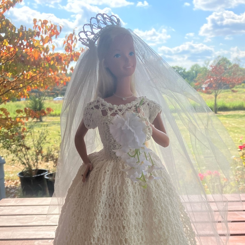 Bride Doll. She looks like Barbie with Vintage Dress